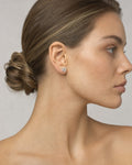 Female model wearing 14k Diamond Shape Earrings
