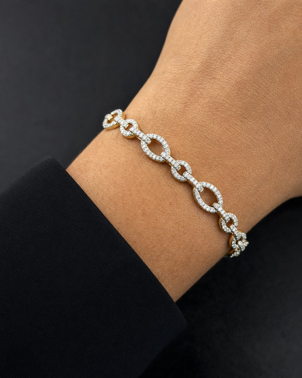 Male model wearing 14k Oval Link Diamond Bracelet