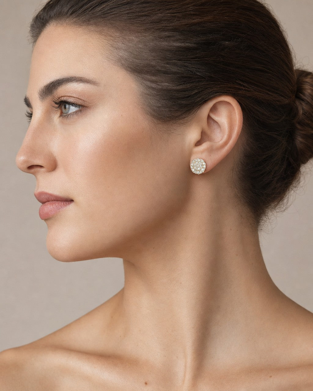 Female model wearing 10K Round Diamond Stud Earrings