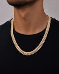 Male model wearing 10k 12mm Diamond Cuban Chain 22”