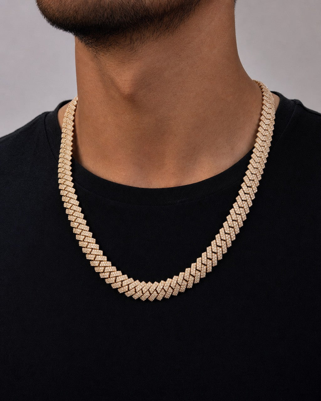 Male model wearing 10k 12mm Diamond Cuban Chain 22”