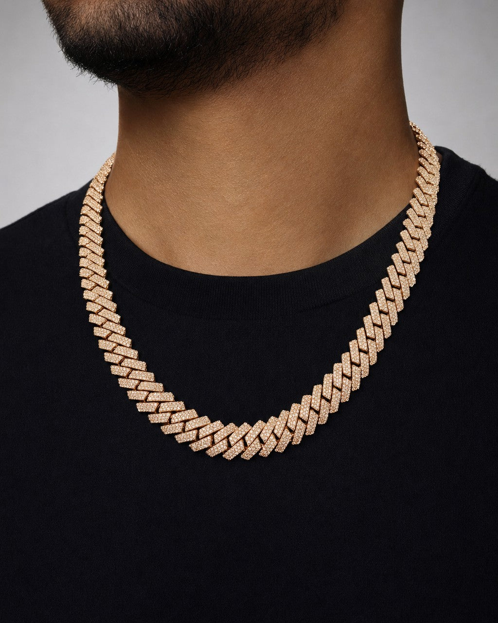 Male model wearing 10k 13.5mm Diamond Cuban Chain 22”