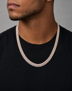Male model wearing 10k 10.5mm Diamond Cuban Chain 22”