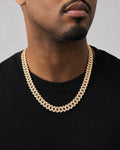 Male model wearing 10k 13mm diamond Cuban Chain 22”
