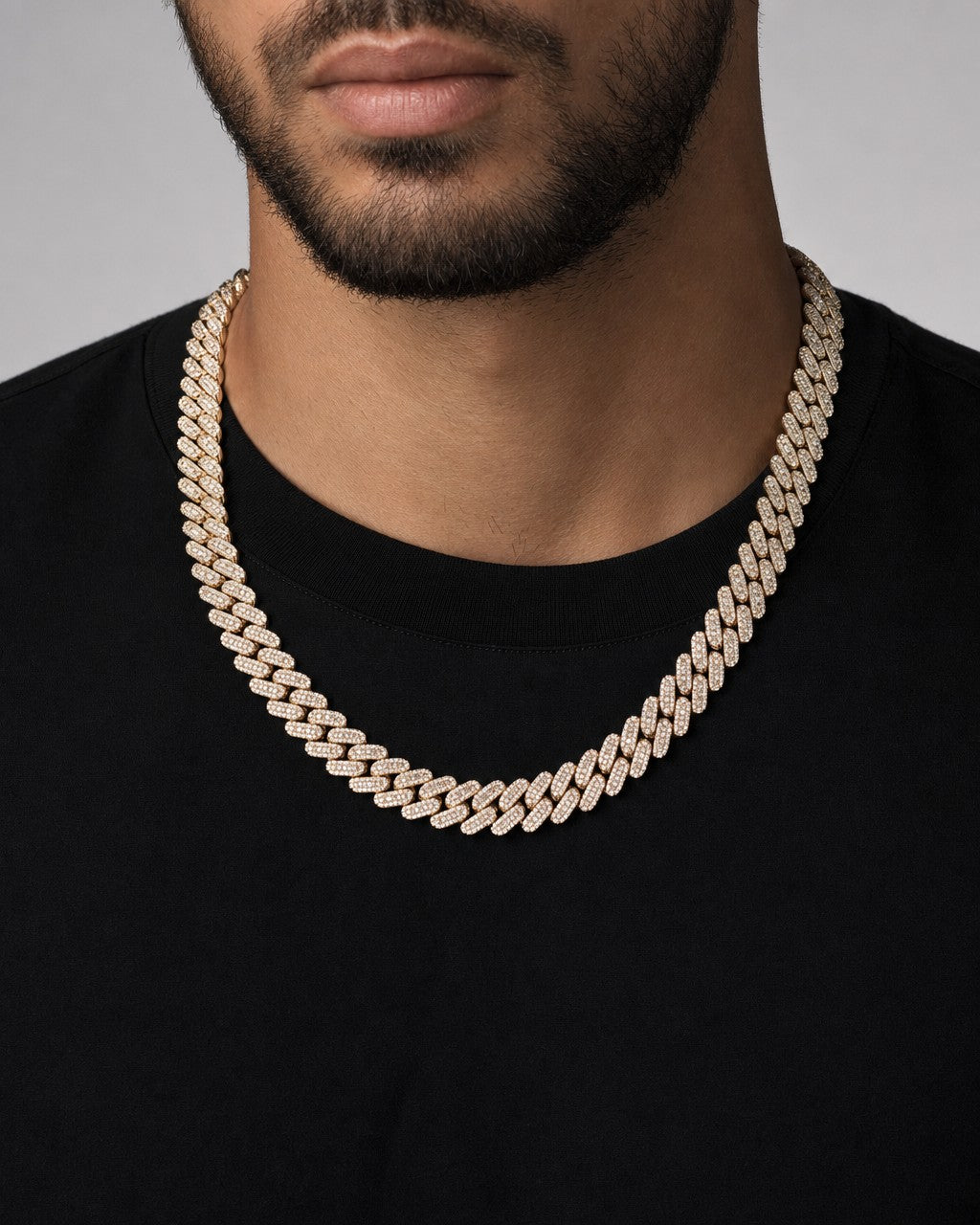 Male model wearing 10K 12M Yellow Gold Baguette Cuban Chain 21"