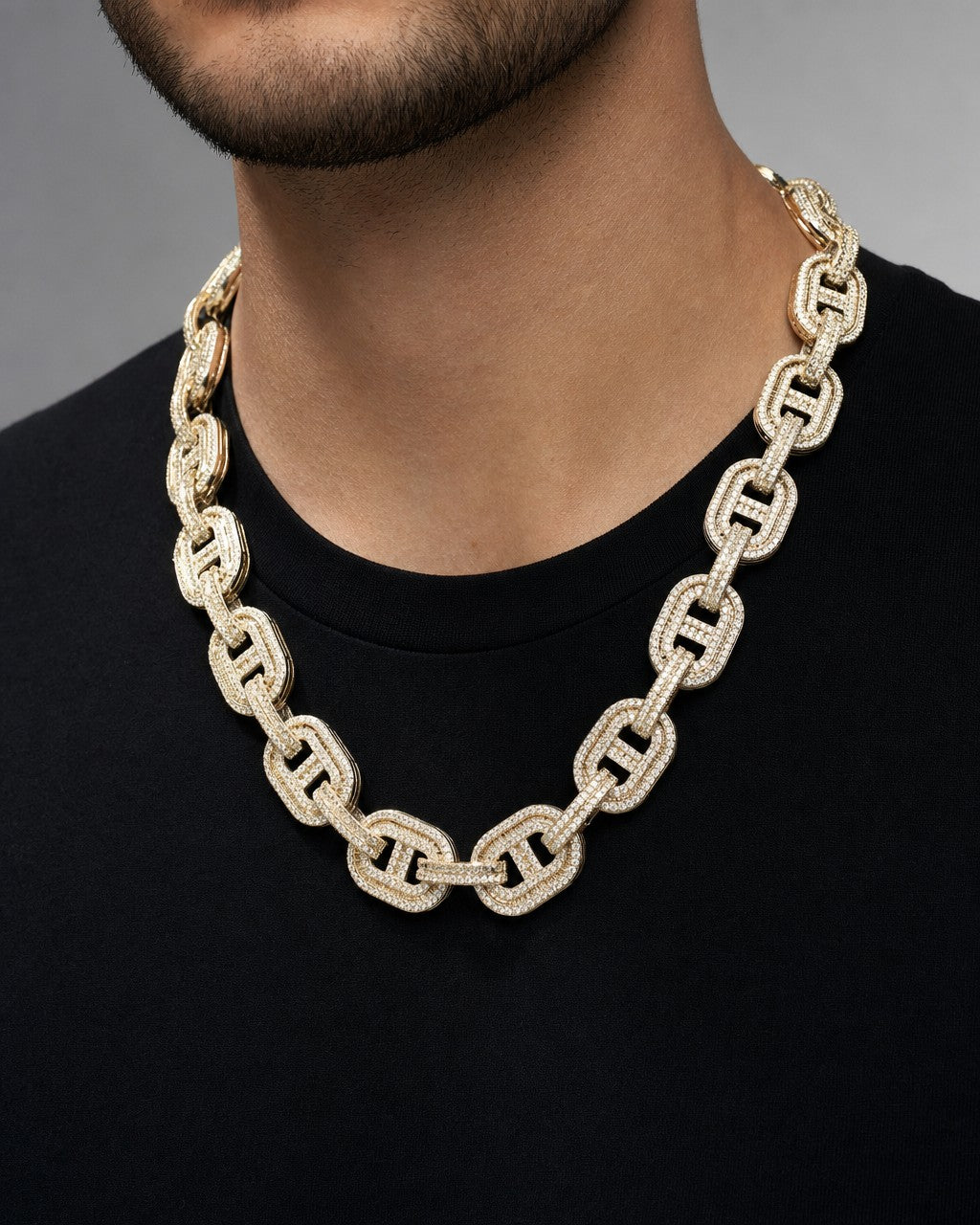 Male model wearing 14k Gucci Link Chain