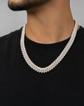 Male model wearing 10k 12mm White Gold Diamond Cuban 22"
