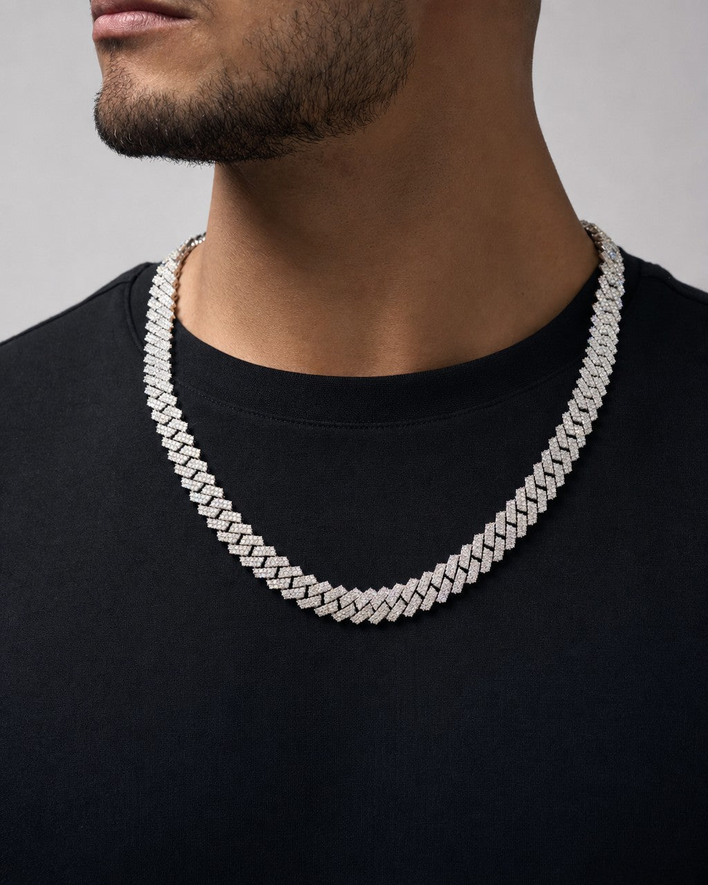 Male model wearing 14k 12.5mm White Gold Diamond Cuban Chain 24”