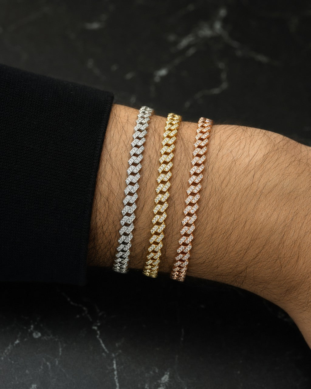 Male model wearing 10K 4.5MM Diamond Cuban Link Bracelet 7"