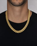 Male model wearing 14K Solid Gold Cuban Chain 15.5mm 22"