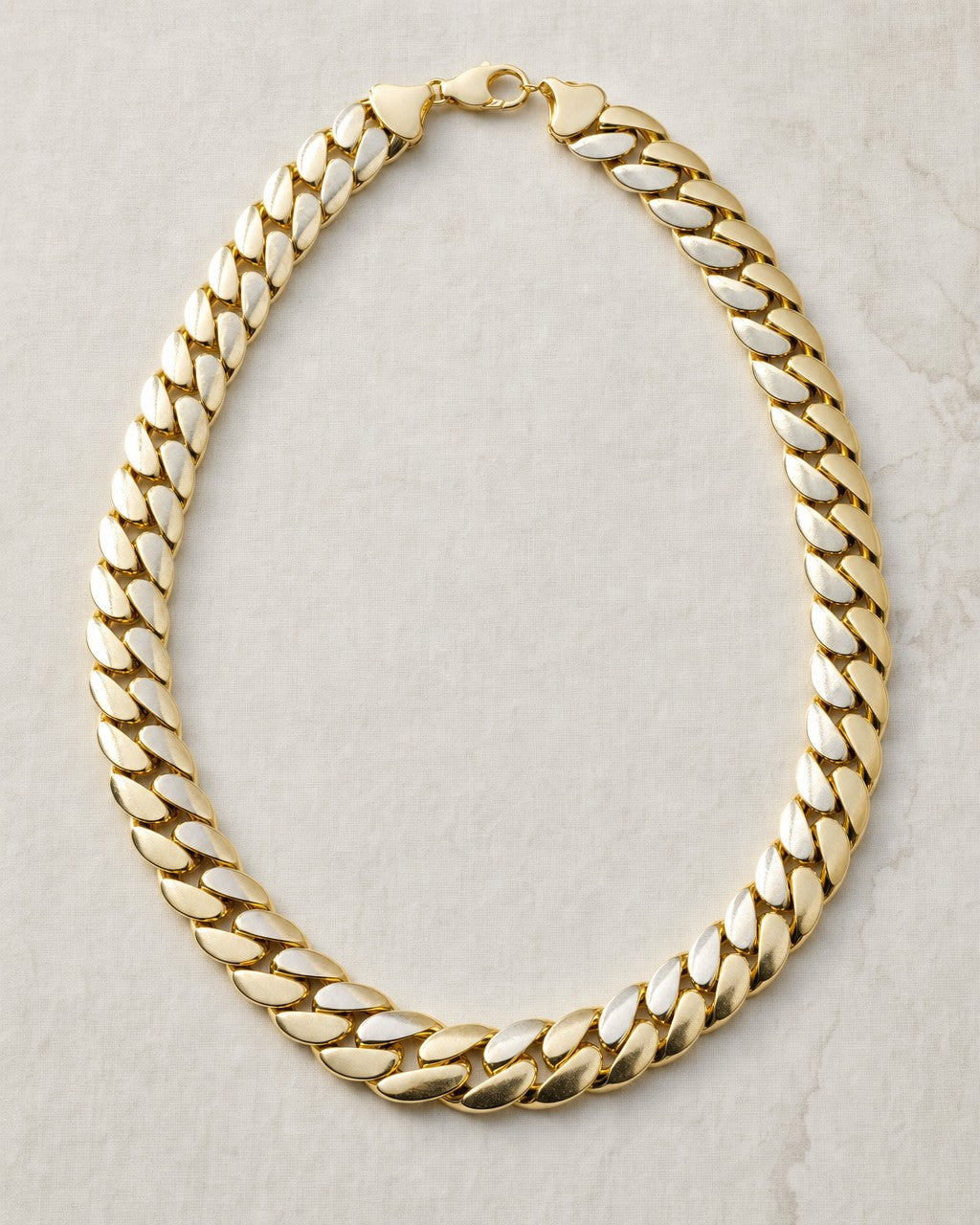 14k Solid Gold Cuban Chain 25M 32I styled photo
