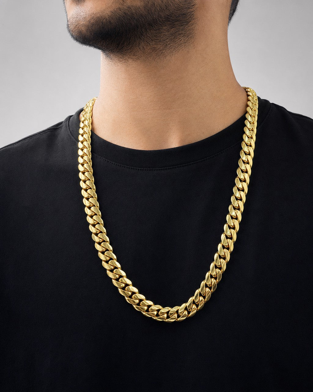 Male model wearing 14K Solid Gold Cuban Chain 15mm 24"
