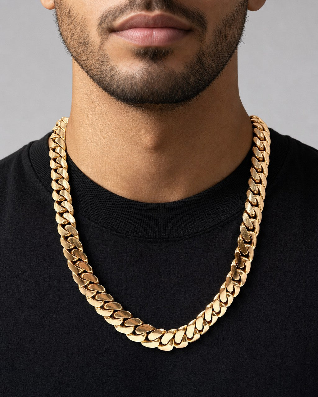 Male model wearing 14k Solid Rose Gold Cuban Chain 21mm 33”