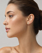 Female model wearing 10K 3D Flower Style Gold & Diamond Earrings