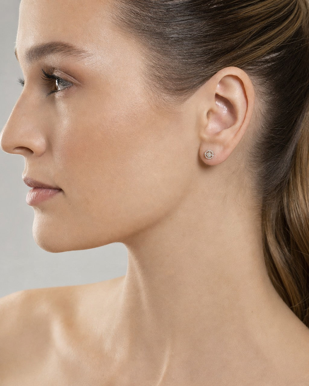 Female model wearing 10K Thick Circle Gap Diamond Earrings