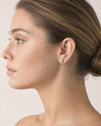 Female model wearing 10k Jumbo Castle Flat studded earring