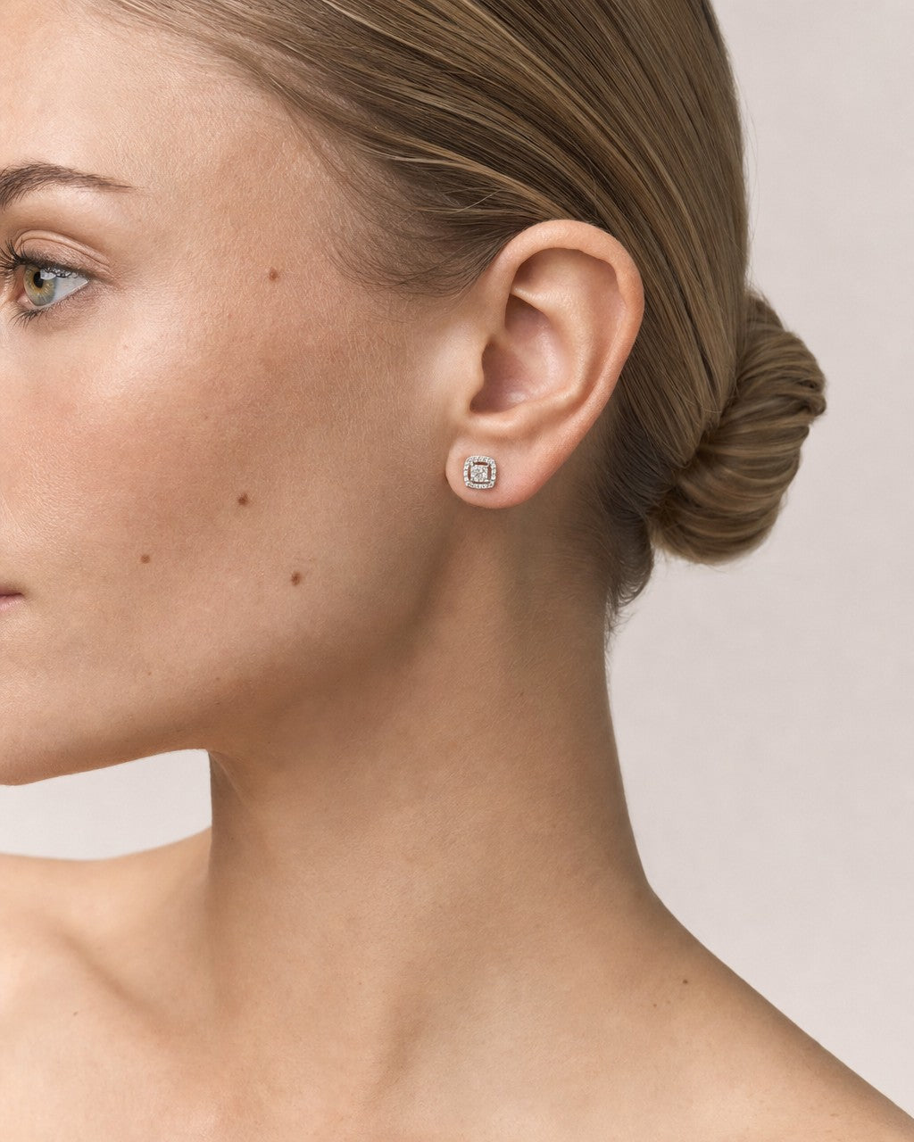 Female model wearing 10k Crown Rounded Square Earring