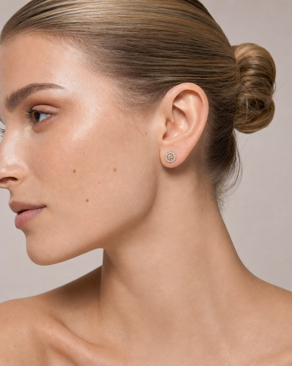 Female model wearing 10k Baguette Firework Earring
