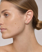 Female model wearing 10k Butterfly Diamond Earrings