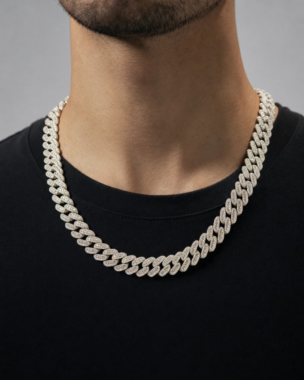 Male model wearing 14K 18.5mm White Gold Baguette Cuban Chain