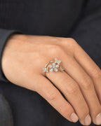 Male model wearing 14K Flower Butterfly Diamond Ring