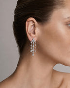 Female model wearing 14K Bridal Shooting Star Earrings