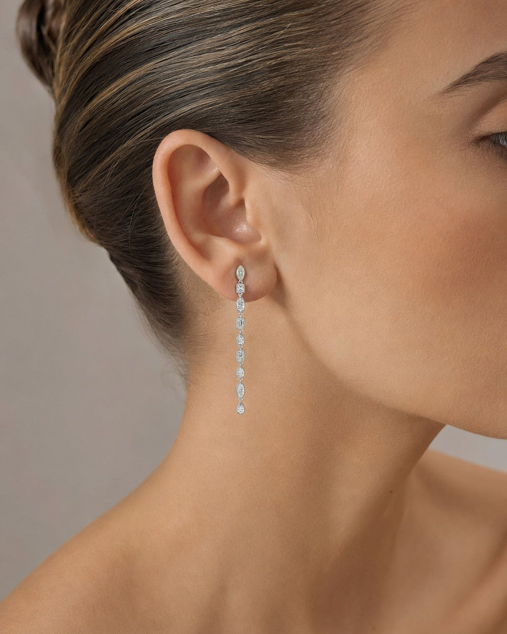 Female model wearing 14K Bridal Shape Cocktail Earrings