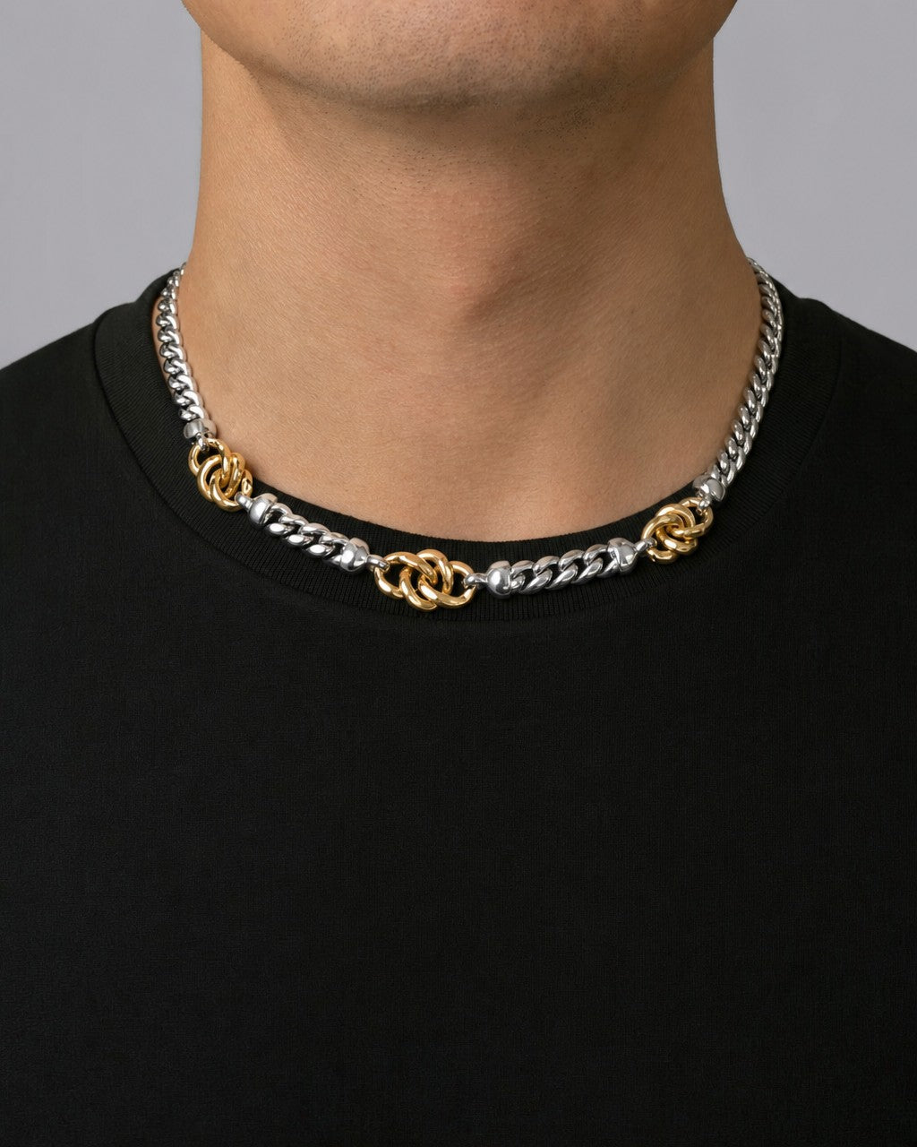 Male model wearing 14k Two-Tone Infinity Necklace