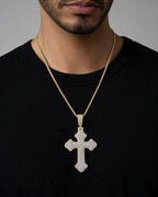 Male model wearing 10K Fancy Cross Pendant