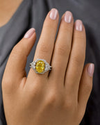 Female model wearing 14K Natural Canary Diamond Engagement Ring