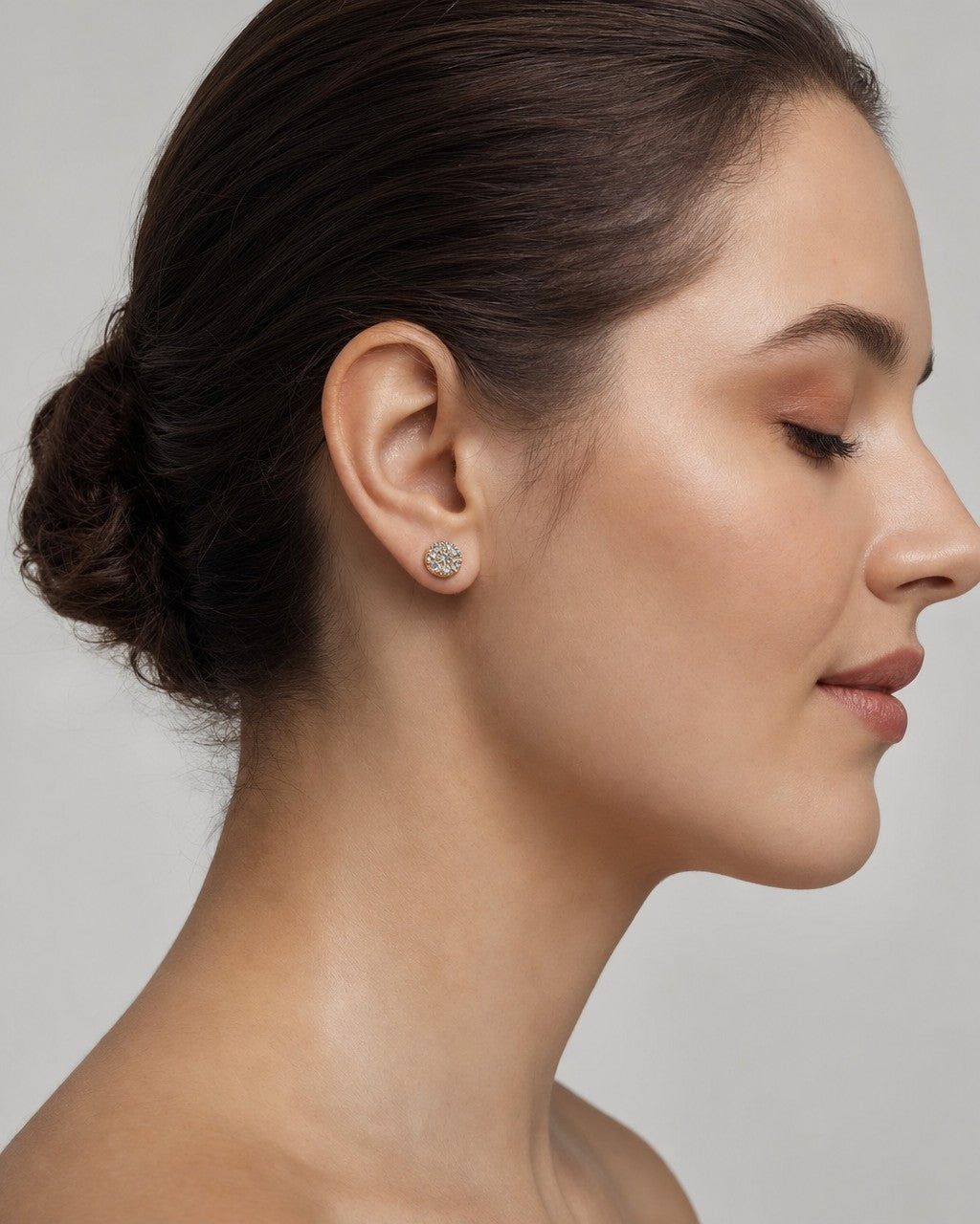 Female model wearing 14k Circle Diamond Earrings