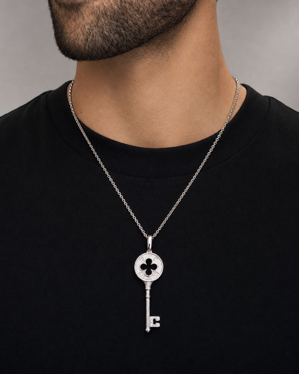 Male model wearing 14K Gold Clover Key Pendant