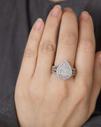 Female model wearing 10K Pear Large Stones Center Halo Diamond Engagement Ring