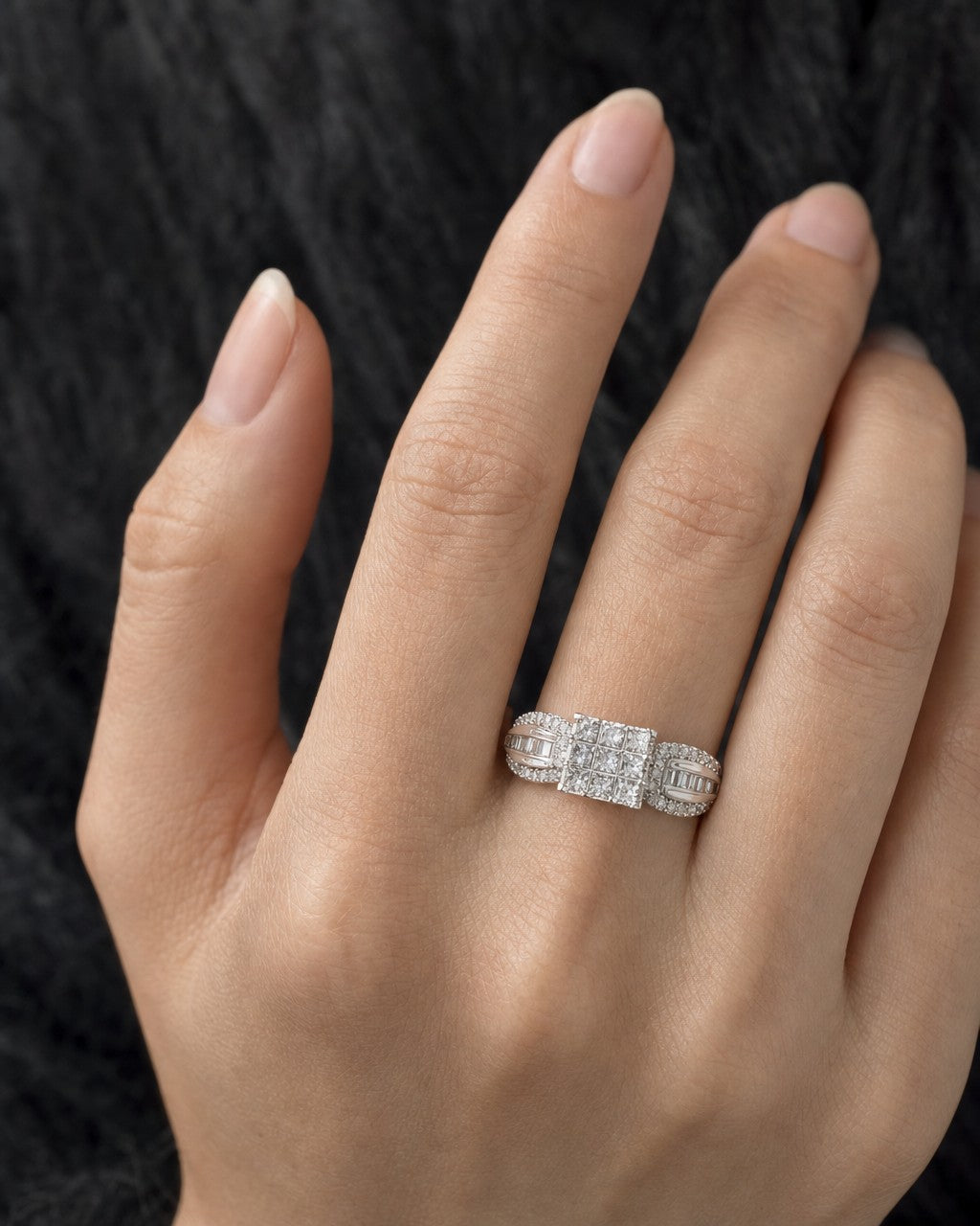 Female model wearing 10K Square Princess Cut Diamond Baguette Engagement Ring