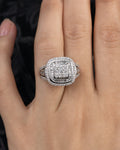 Female model wearing 10K Large Stone Center Square Halo Diamond Baguette Engagement Ring