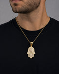 Male model wearing 14K Hamsa Diamond Baguette Pendant