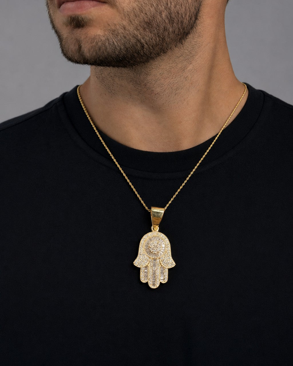 Male model wearing 14K Hamsa Diamond Baguette Pendant