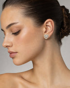 Female model wearing 14K Parisian Heart Diamond Baguette Earrings