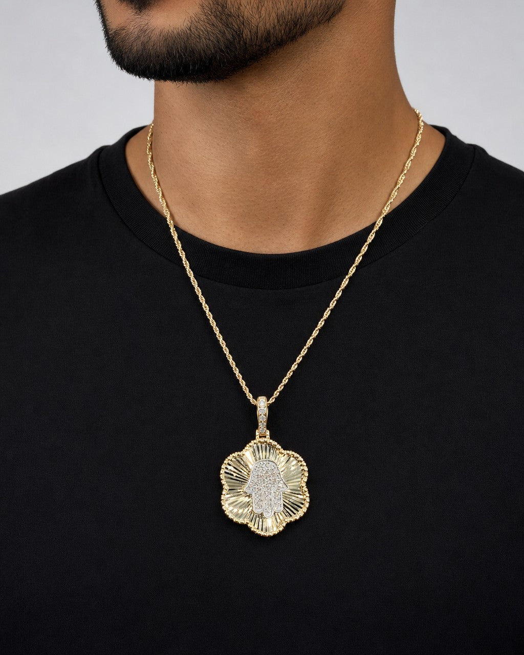 Male model wearing 14K Hamsa Shine Diamond Floral Pendant