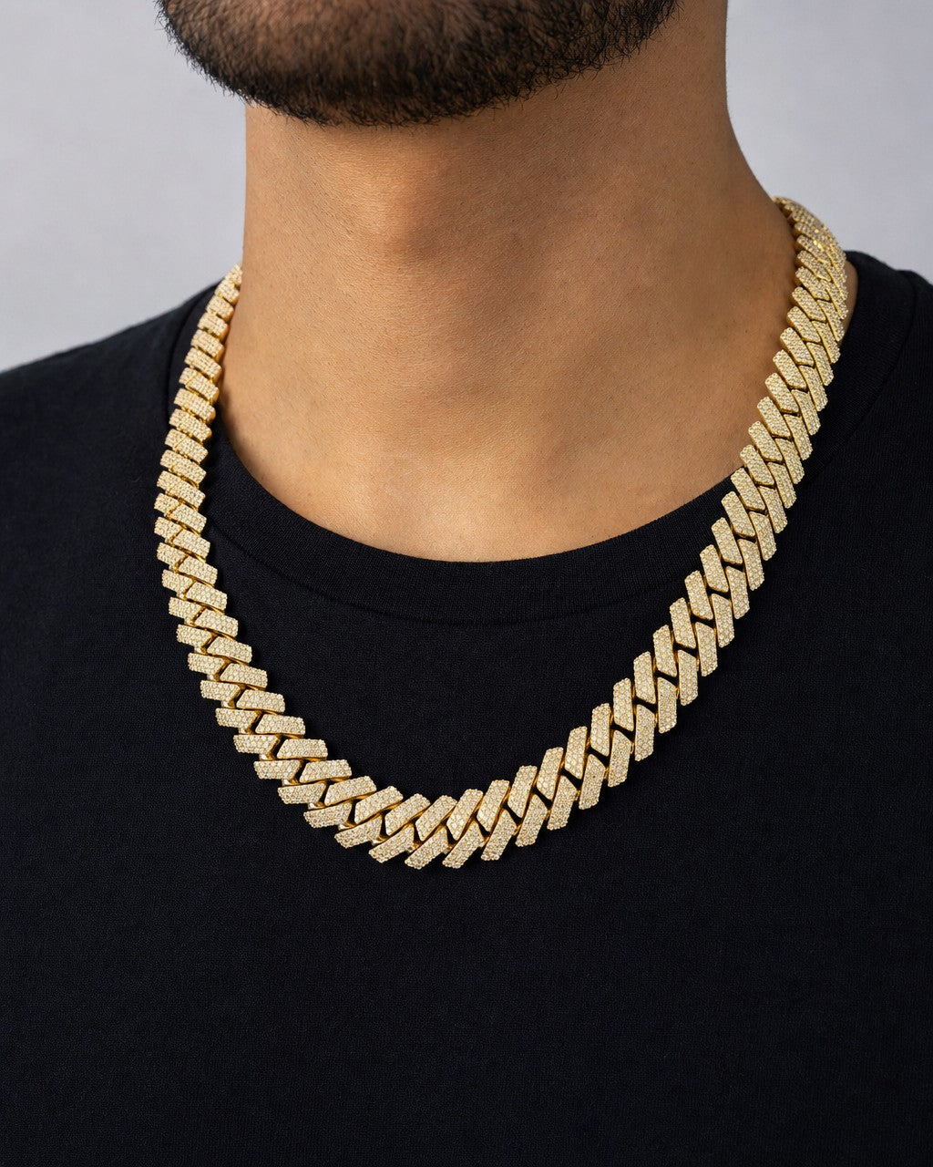 Male model wearing 10K 16MM Cuban Link Diamond Chain 22"
