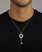 Male model wearing 14K Key Pendant