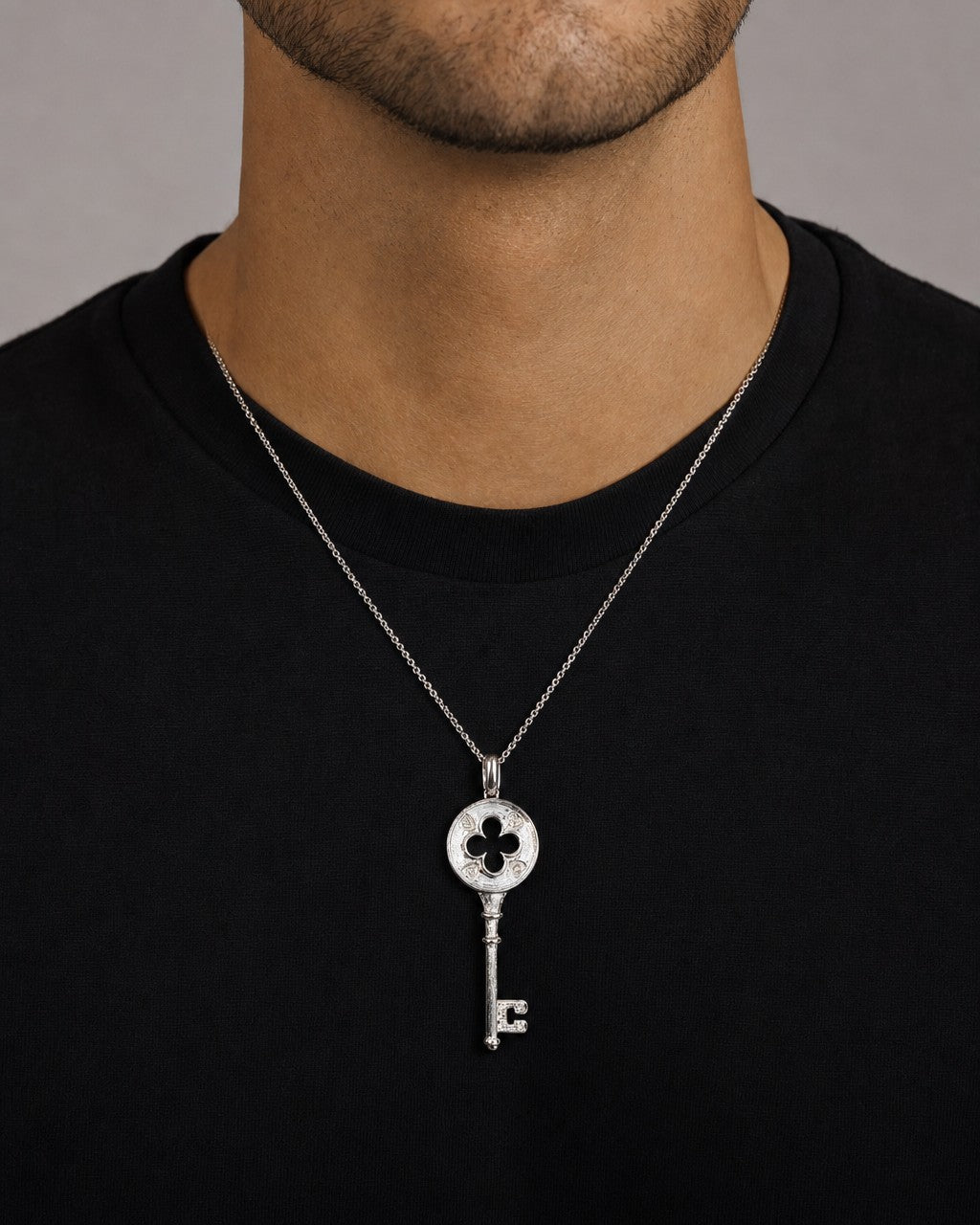Male model wearing 14K Key Pendant