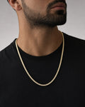 Male model wearing 10K 3.3MM Square Diamond Tennis Chain 20"