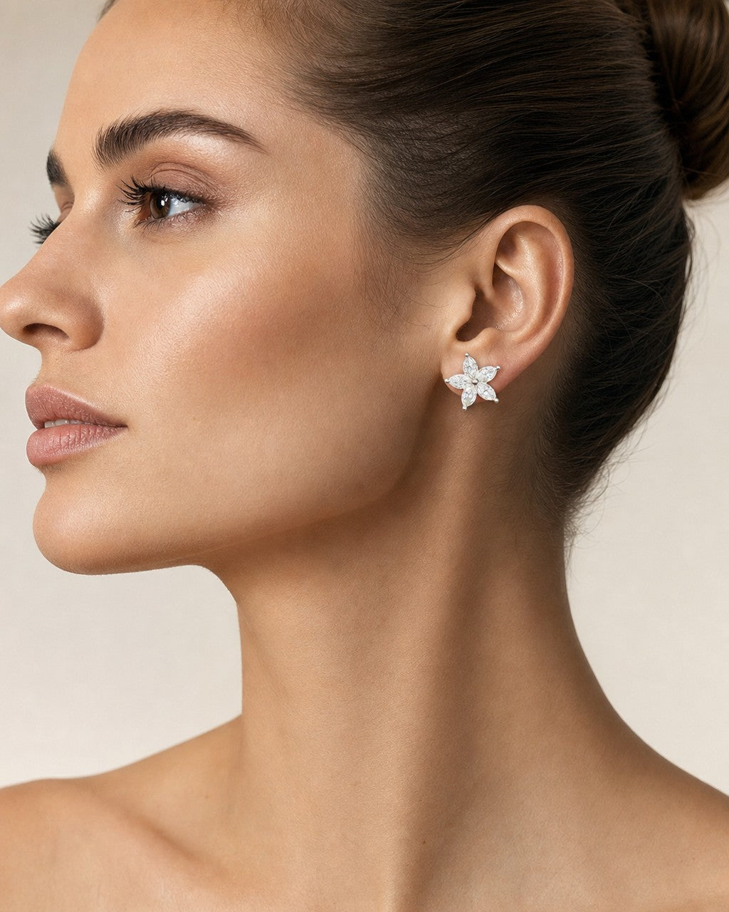 Female model wearing 14K Summer Flower Diamond Earrings