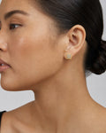Female model wearing 14K Masterpiece Square Diamond Earrings