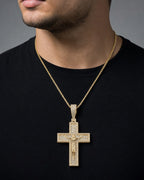 Male model wearing 14K Sunday Cross Diamond Pendant