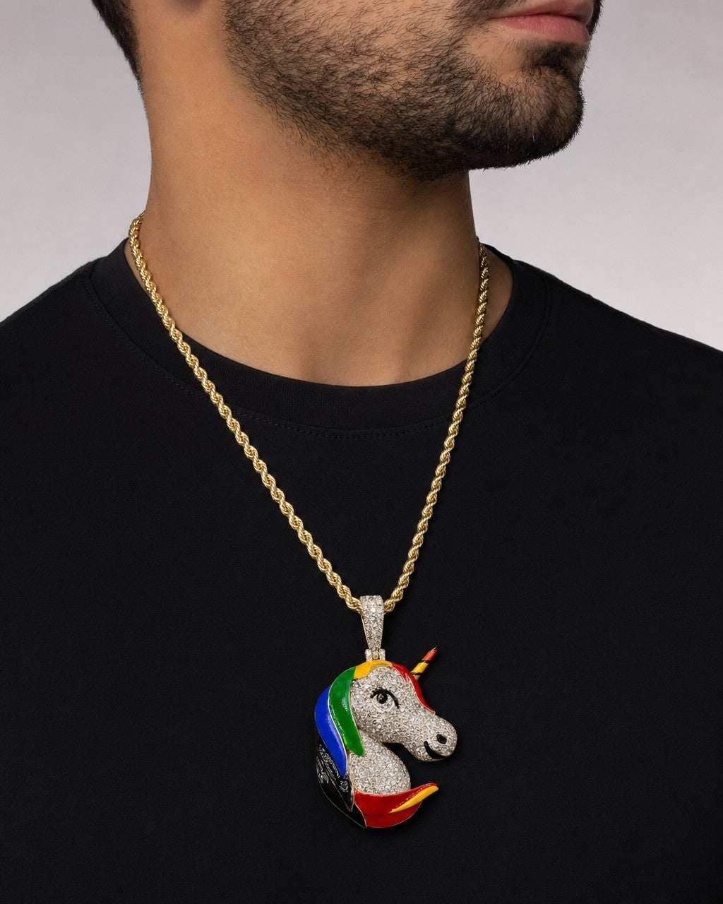 Male model wearing 14K Pride Rainbow Unicorn Diamond Pendant