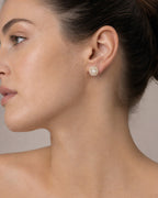 Female model wearing 14K Titan Circle Diamond Baguette Earrings