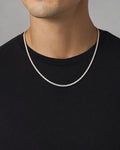 Male model wearing 10K 2.9MM Diamond Tennis Chain Necklace 16"