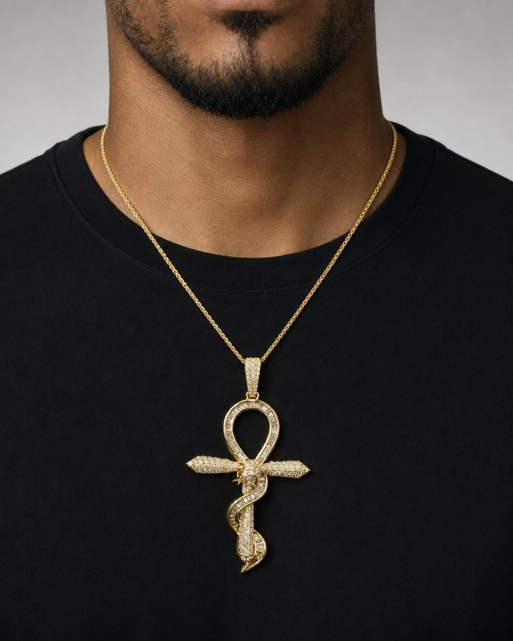 Male model wearing 10K Snake Ankh Diamond Pendant